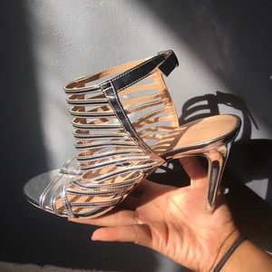 Shiny silver prom heels.